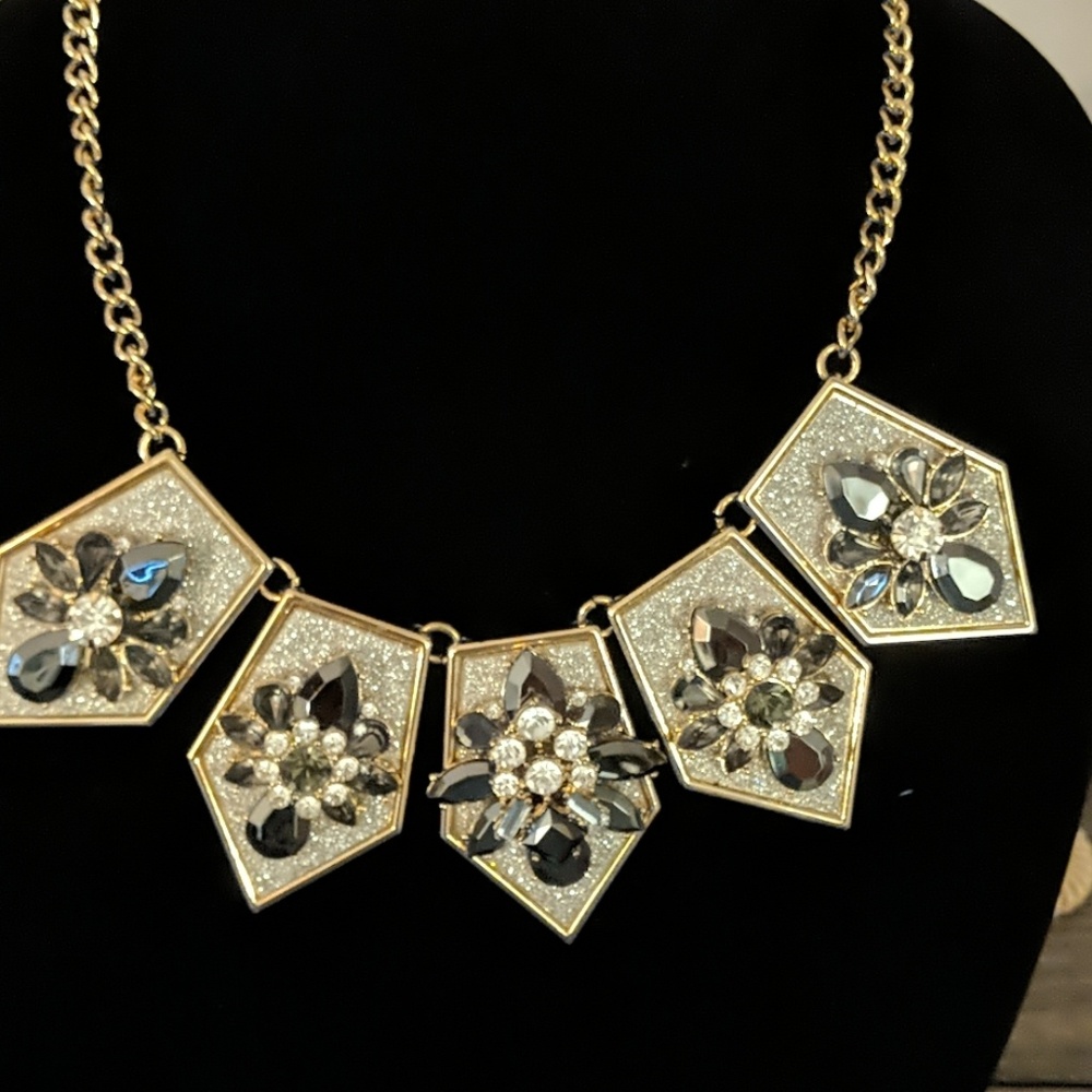 Necklace with gray and silver crystal stones